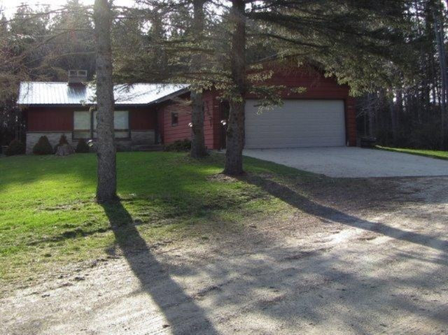8086 River Road Evart, MI 49631 - Photo 1 of 26 front