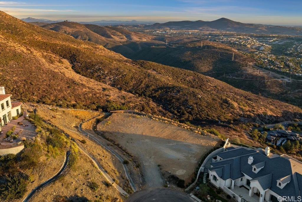 82 El Brazo Rancho Santa Fe, CA 92067 - Photo 6 of 23 a view of a lake with a mountain