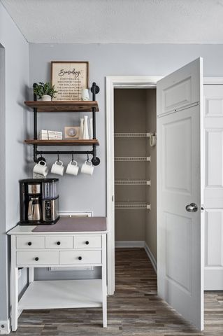 a view of kitchen cabinetry