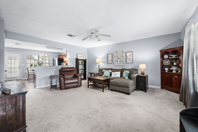 a bed room with furniture and a window