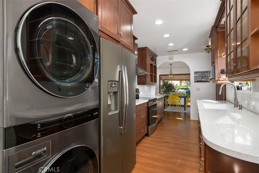 5117 Vincent Avenue Eagle Rock, CA 90041 - Photo 11 of 46 a kitchen with a sink stainless steel appliances and a counter top space