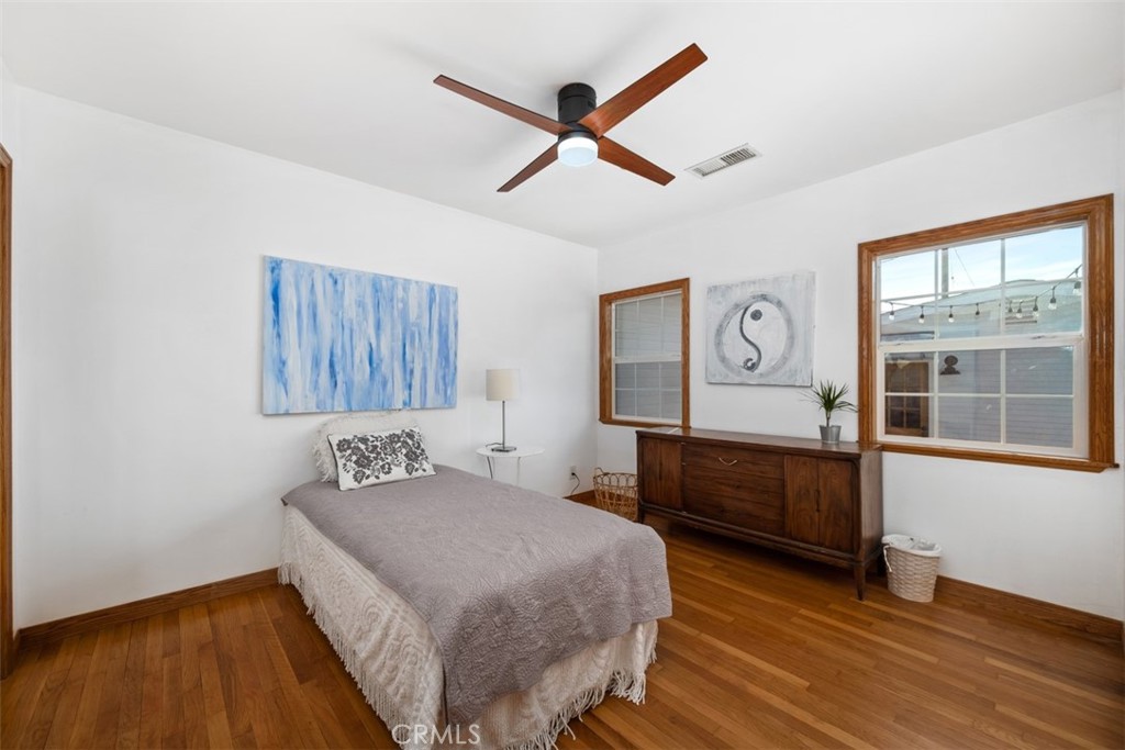 5117 Vincent Avenue Eagle Rock, CA 90041 - Photo 16 of 46 a bedroom with a bed and a window