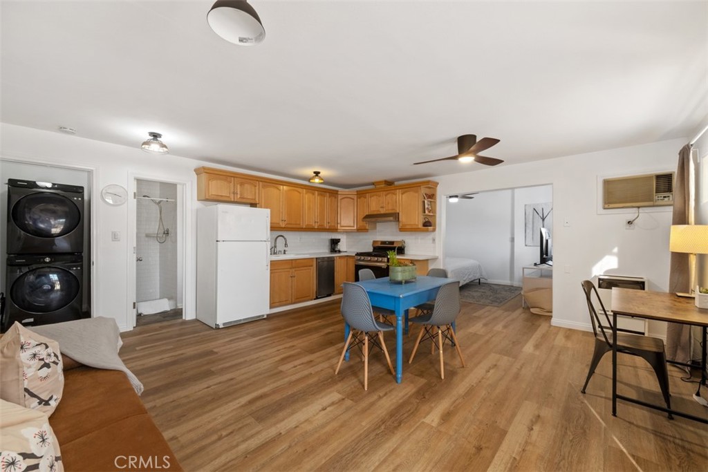 5117 Vincent Avenue Eagle Rock, CA 90041 - Photo 18 of 46 a bed room with furniture and a wooden floor