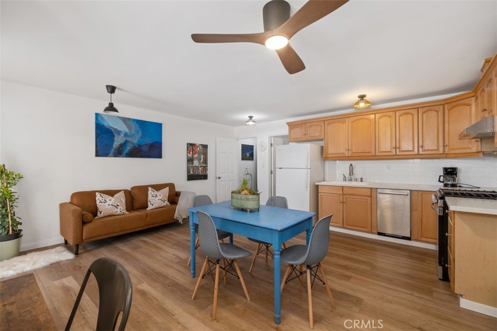 5117 Vincent Avenue Eagle Rock, CA 90041 - Photo 21 of 46 a living room with furniture and kitchen view