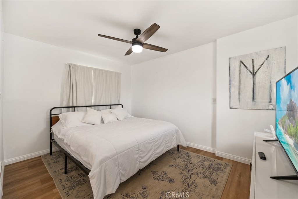 5117 Vincent Avenue Eagle Rock, CA 90041 - Photo 23 of 46 a bedroom with a bed and a window