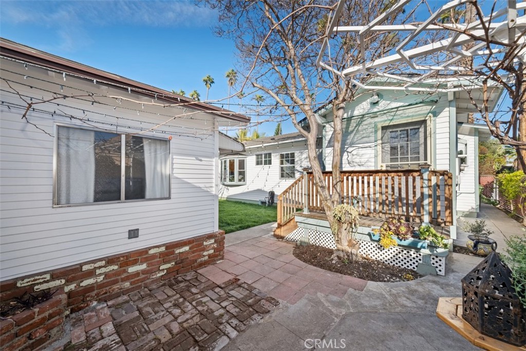 5117 Vincent Avenue Eagle Rock, CA 90041 - Photo 26 of 46 a front view of a house with a yard