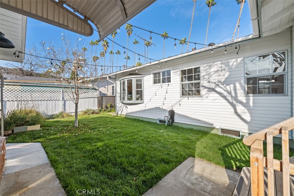 5117 Vincent Avenue Eagle Rock, CA 90041 - Photo 27 of 46 a front view of a house with a garden and deck