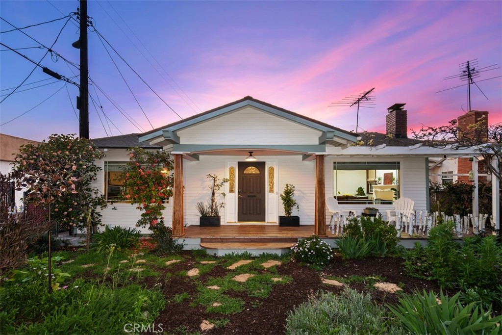 5117 Vincent Avenue Eagle Rock, CA 90041 - Photo 37 of 46 a front view of a house with garden