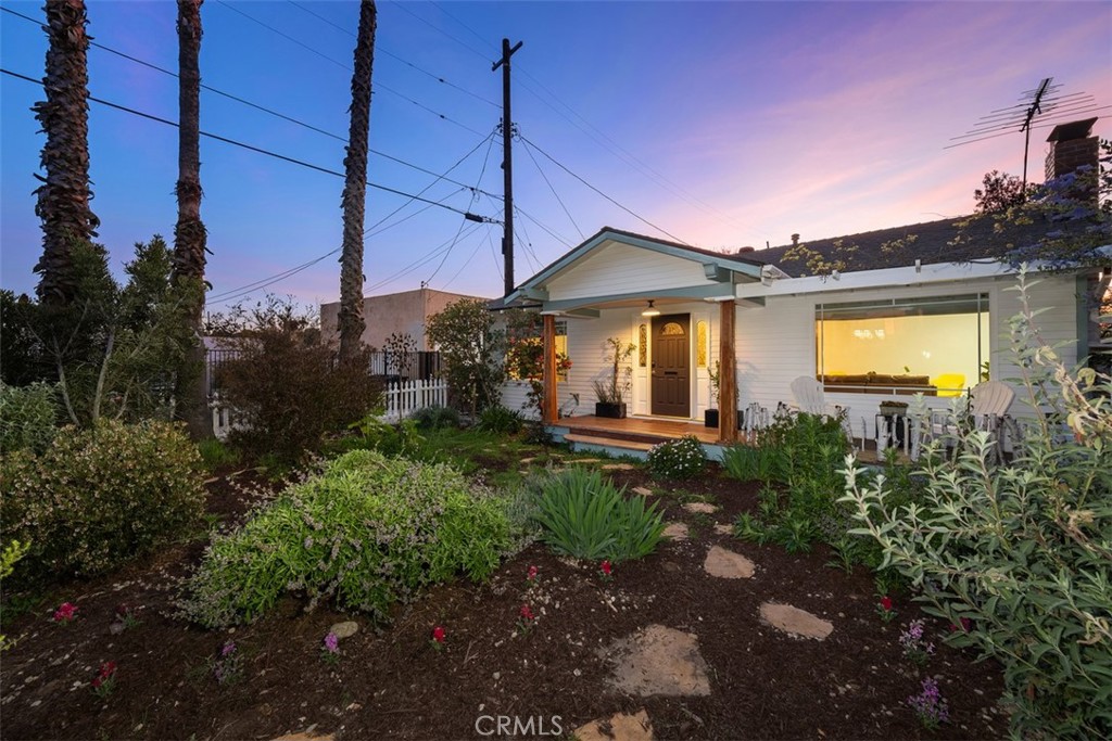 5117 Vincent Avenue Eagle Rock, CA 90041 - Photo 38 of 46 a front view of a house with garden
