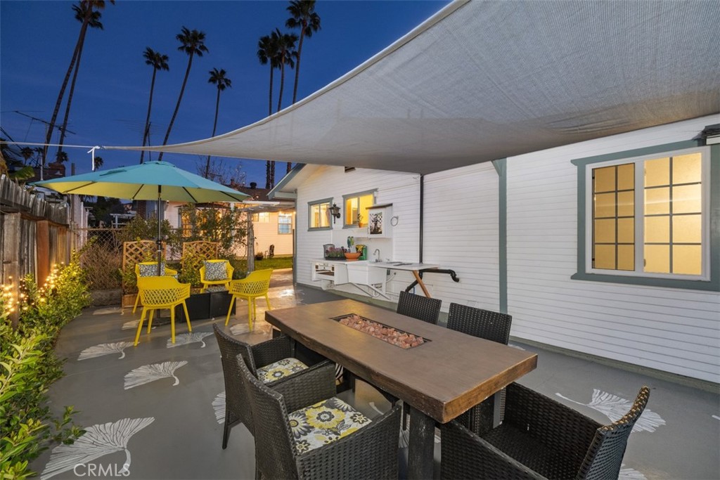 5117 Vincent Avenue Eagle Rock, CA 90041 - Photo 42 of 46 a view of a tables and chairs under an umbrella