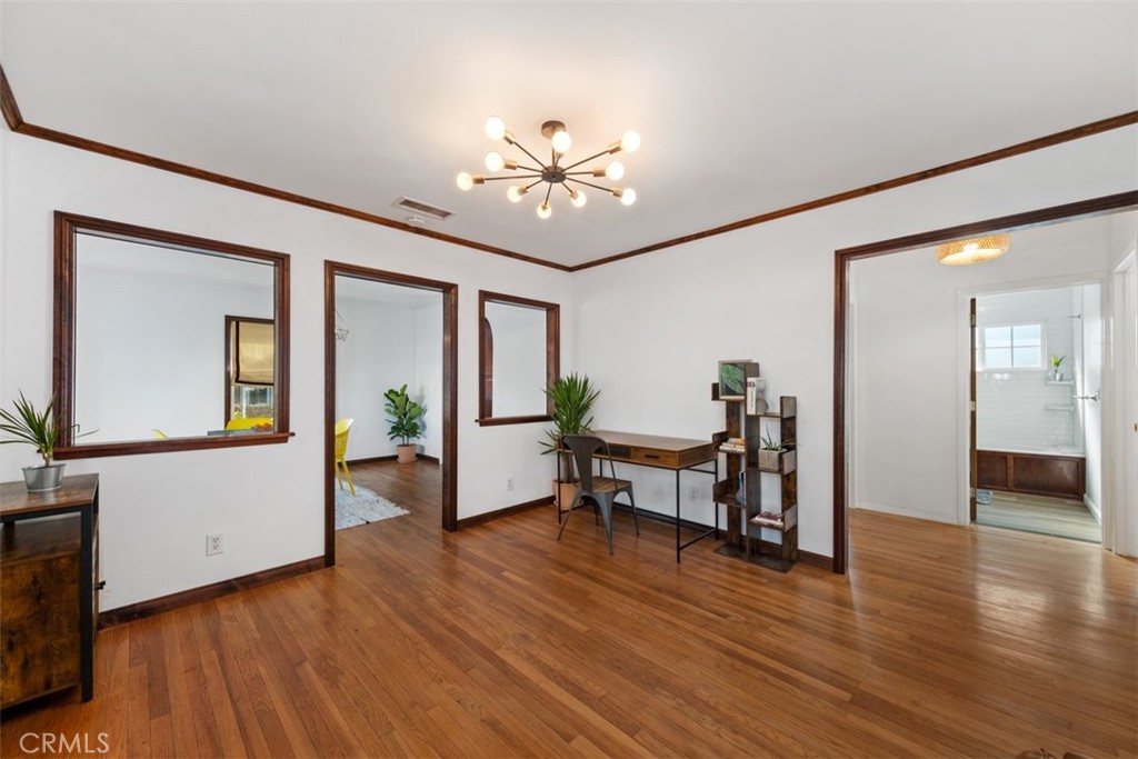 5117 Vincent Avenue Eagle Rock, CA 90041 - Photo 5 of 46 a view of a livingroom with furniture and wooden floor