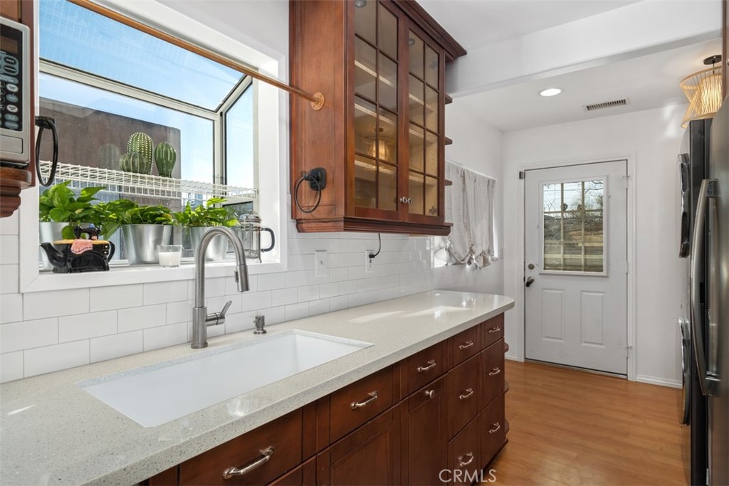 5117 Vincent Avenue Eagle Rock, CA 90041 - Photo 10 of 46 a bathroom with a sink and a mirror