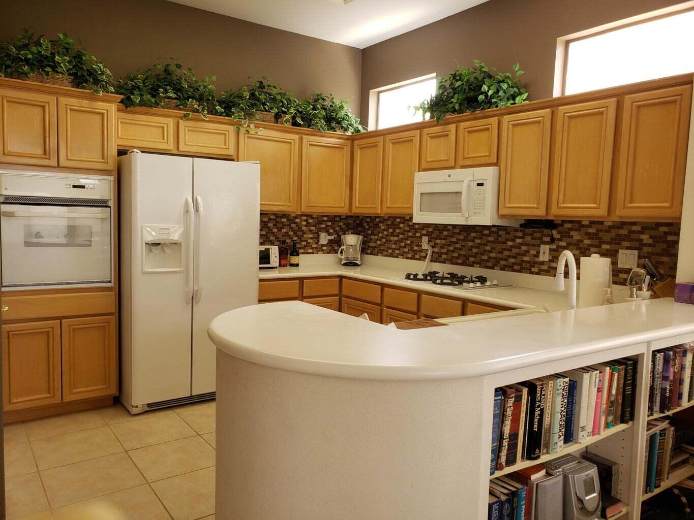 78786 Gorham Lane Palm Desert, CA 92211 - Photo 11 of 26 a bathroom with a sink a mirror and a shower