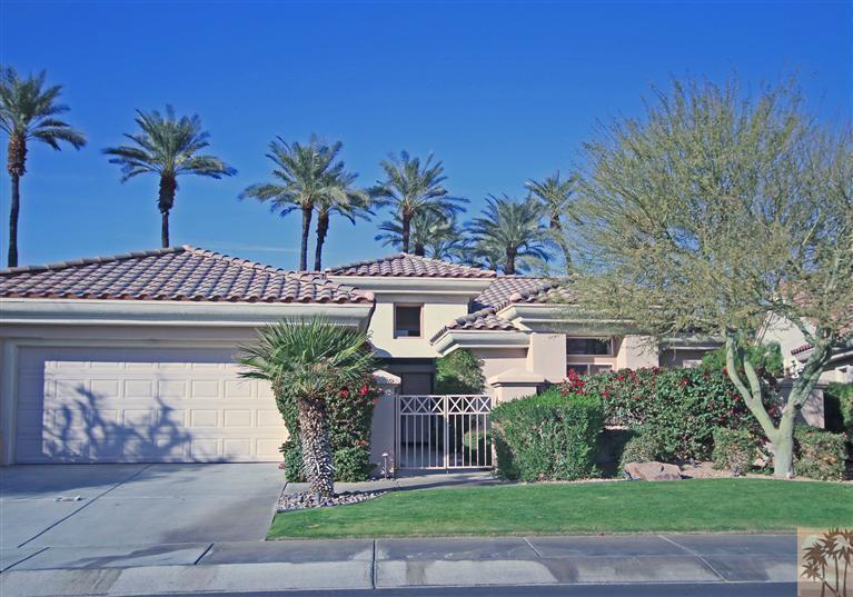 78786 Gorham Lane Palm Desert, CA 92211 - Photo 2 of 26 a front view of a house with a garden
