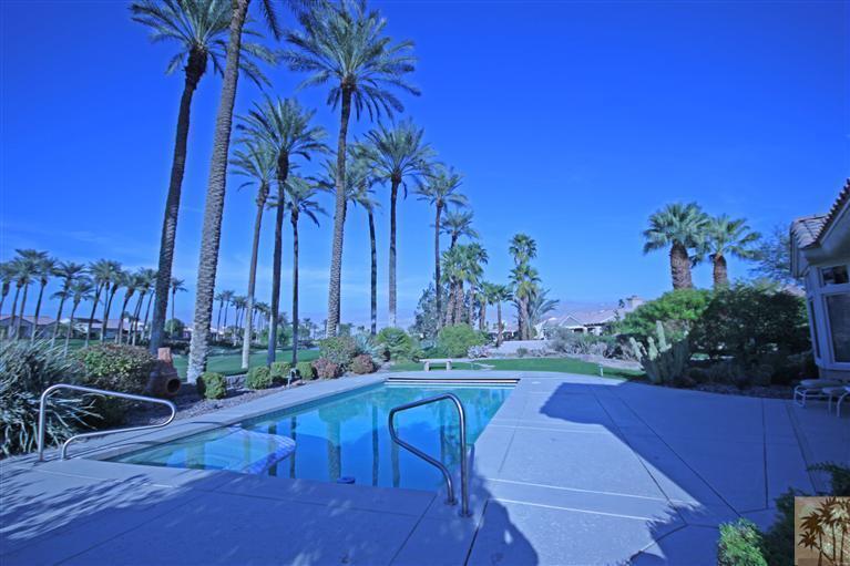 78786 Gorham Lane Palm Desert, CA 92211 - Photo 26 of 26 a view of a backyard with plants and palm trees