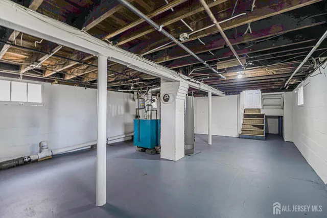 a view of a backyard with wooden fence