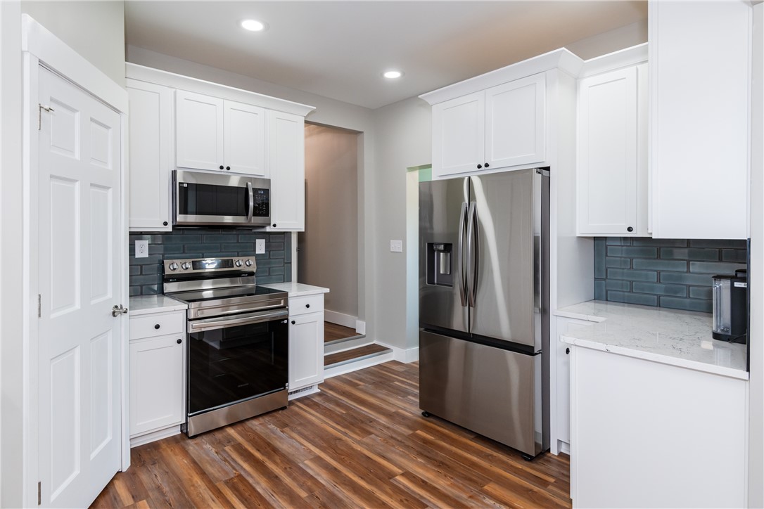1217 Jasper Road Xenia, OH 45385 - Photo 22 of 62 This bright kitchen features sleek appliances and ample counter space.