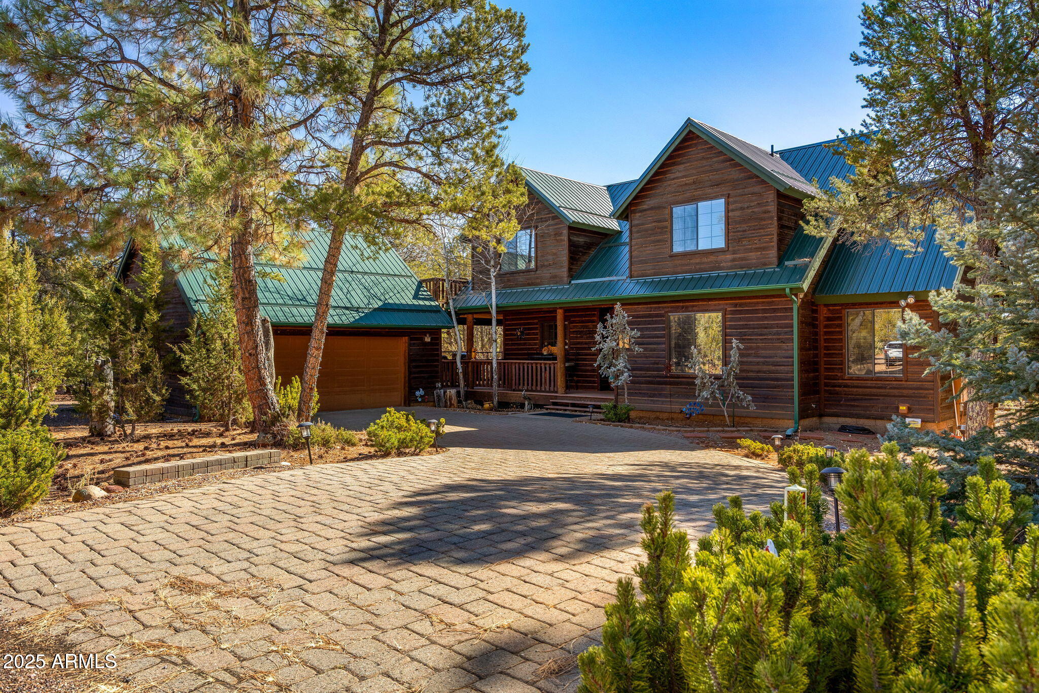 a view of a house with snow on the wall