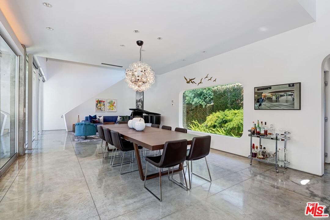 1342 Appleton Way Venice, CA 90291 - Photo 15 of 46 a view of a dining room with furniture and chandelier