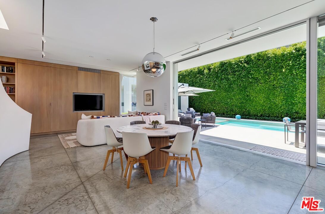 1342 Appleton Way Venice, CA 90291 - Photo 19 of 46 a dining room with furniture a garden and patio