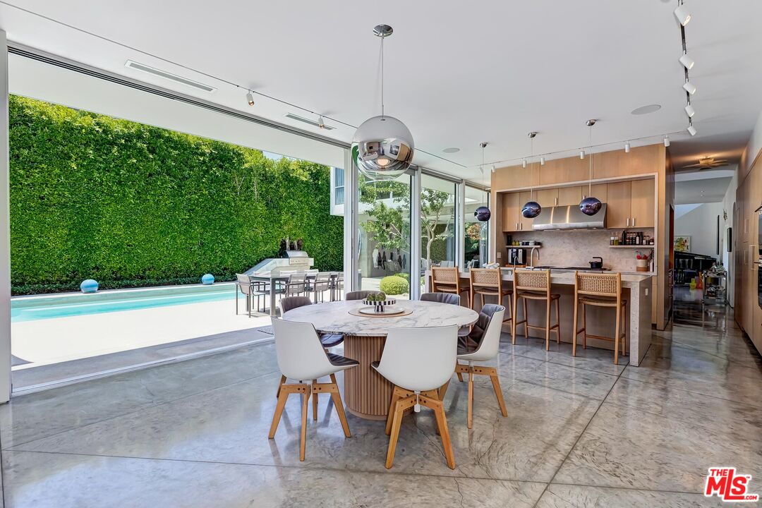 1342 Appleton Way Venice, CA 90291 - Photo 21 of 46 a view of a dining room with furniture window and outside view