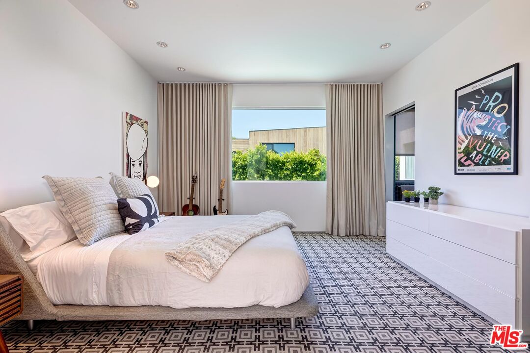 1342 Appleton Way Venice, CA 90291 - Photo 25 of 46 a bedroom with a bed and a couch