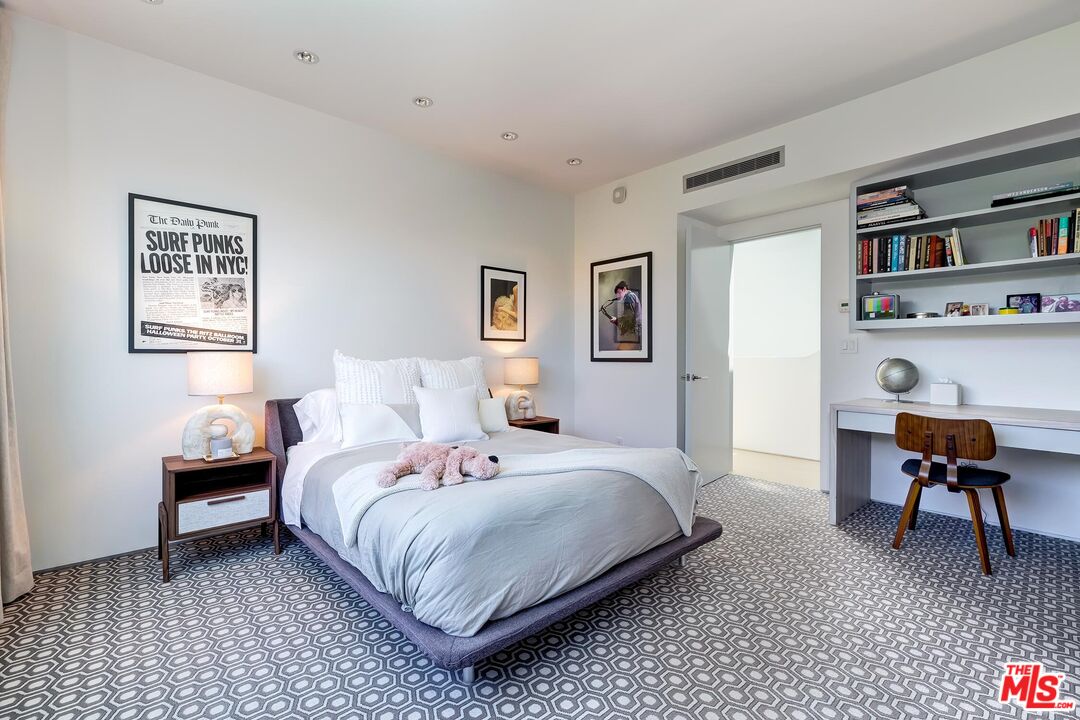 1342 Appleton Way Venice, CA 90291 - Photo 27 of 46 a bedroom with a bed and a chair