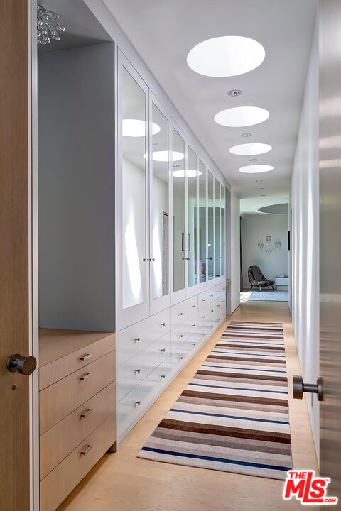1342 Appleton Way Venice, CA 90291 - Photo 30 of 46 a view of a hallway with closet and a chandelier