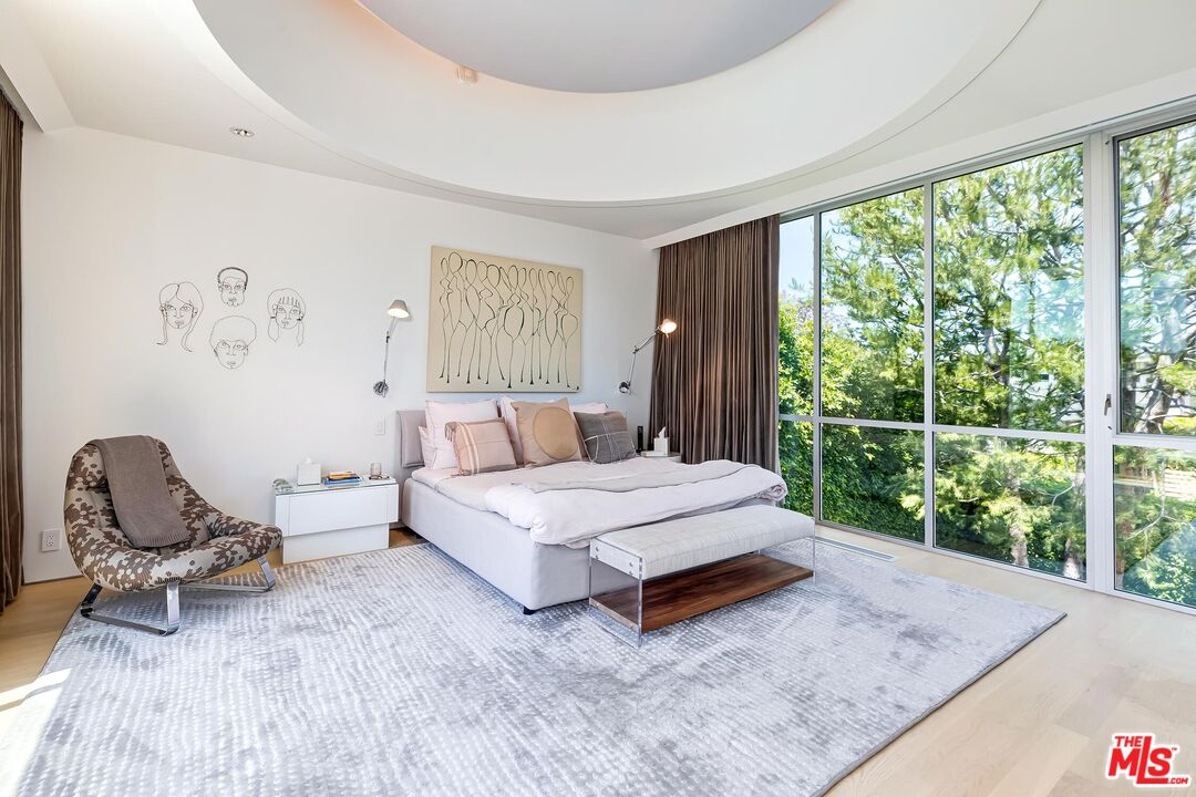 1342 Appleton Way Venice, CA 90291 - Photo 31 of 46 a bedroom with a bed and large windows