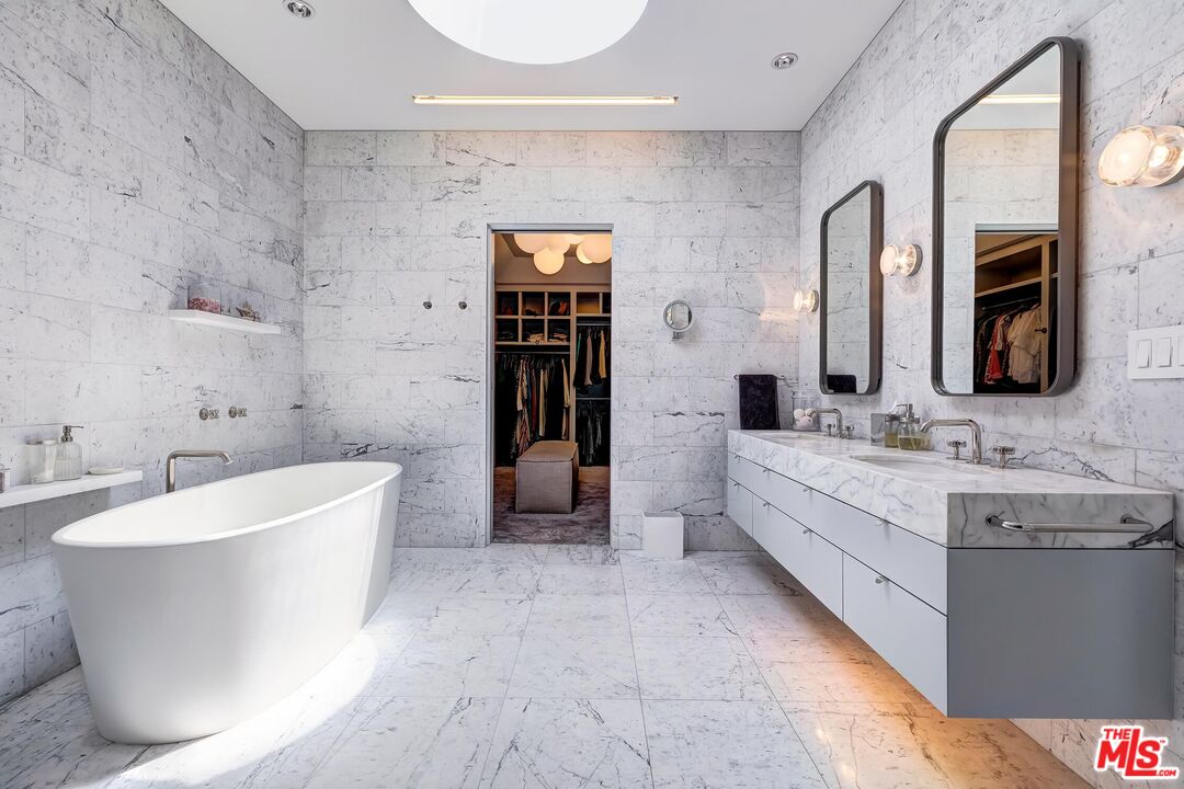1342 Appleton Way Venice, CA 90291 - Photo 34 of 46 a spacious bathroom with a double vanity sink mirror and bathtub