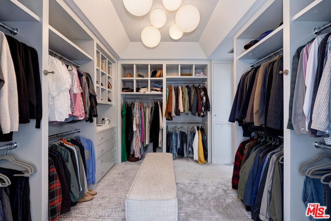 1342 Appleton Way Venice, CA 90291 - Photo 35 of 46 a view of walk in closet with clothes and shoes
