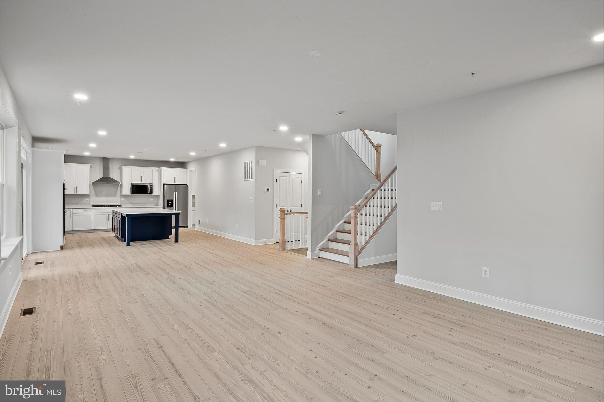 4496 Ilchester Road Ellicott City, MD 21043 - Photo 13 of 61 Family room view to kitchen