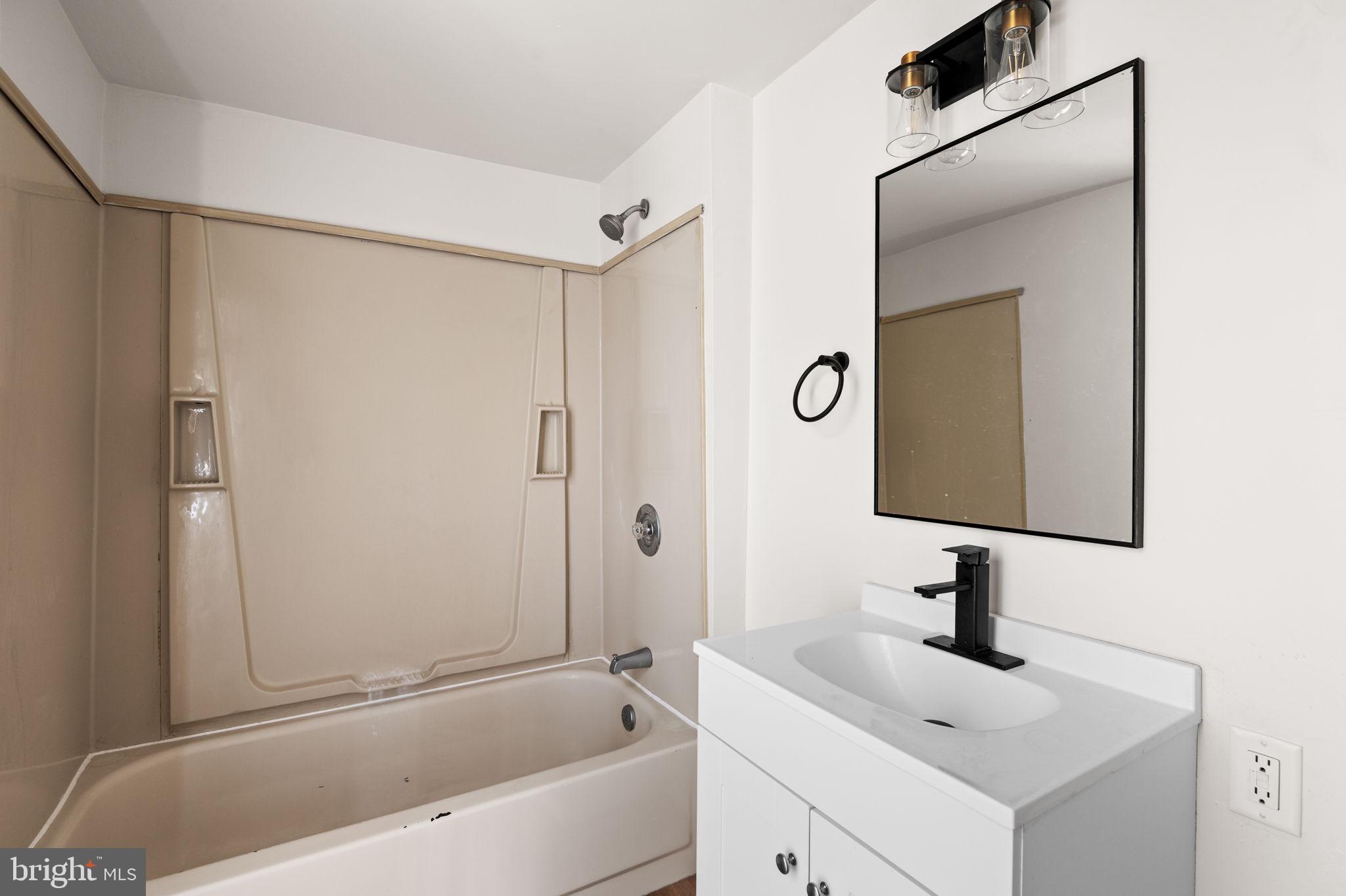 322 South Poppleton Street Baltimore, MD 21230 - Photo 13 of 34 Modern bathroom with sleek finishes.