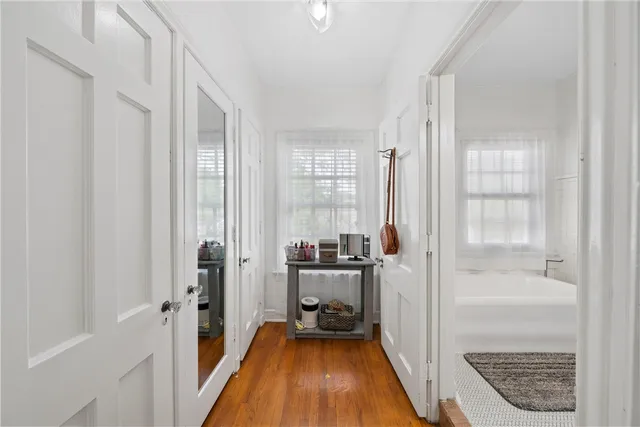 a bathroom with a tub and shower