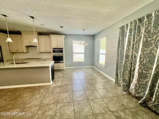 a bathroom with a sink and a bathtub