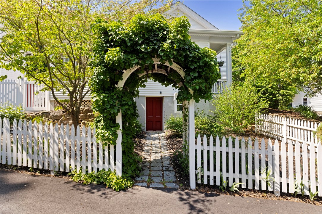 422 N Road Scituate, RI 02831 - Photo 44 of 50 Arched trellis leads to basement walk out
