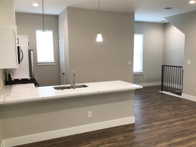 a view of a kitchen and a sink