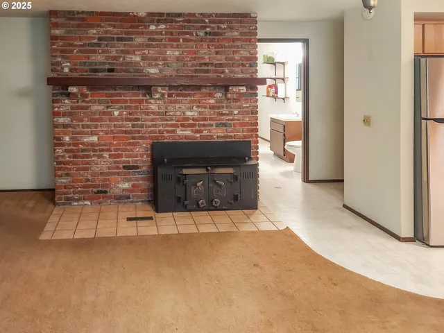 a living room with a fireplace