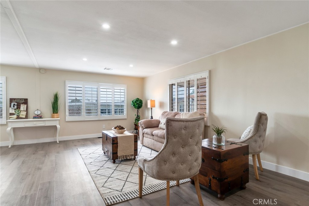 10210 Base Line Road, Unit 115 Rancho Cucamonga, CA 91701 - Photo 8 of 23 a living room with furniture and a window