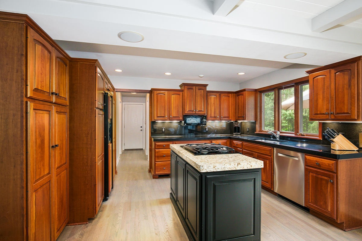 9530 Ravine Ridge Drive Southeast Caledonia, MI 49316 - Photo 4 of 66 Custom Cherry Cabinetry