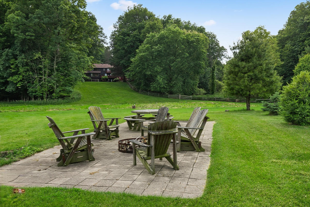 9530 Ravine Ridge Drive Southeast Caledonia, MI 49316 - Photo 42 of 66 Patio and Firepit on Riverbank