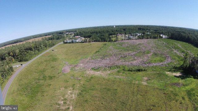Parcels Harris Road Kilmarnock, VA 22482 - Photo 3 of 8 a view of a field with an ocean
