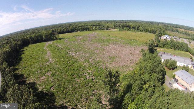 Parcels Harris Road Kilmarnock, VA 22482 - Photo 7 of 8 a view of a field with an ocean