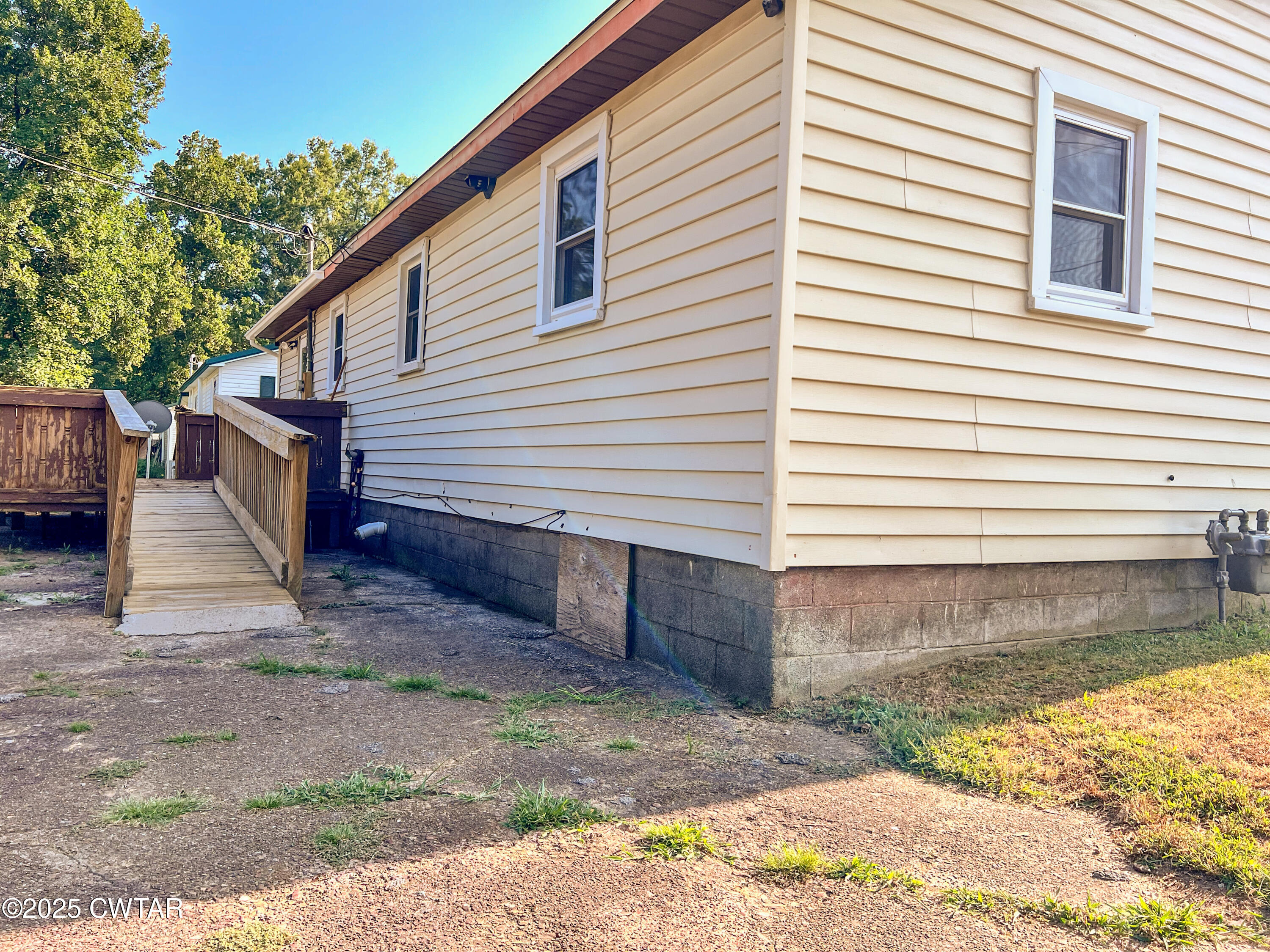 154 North Winchester Street McKenzie, TN 38201 - Photo 21 of 24 a view of a house with a yard and garage