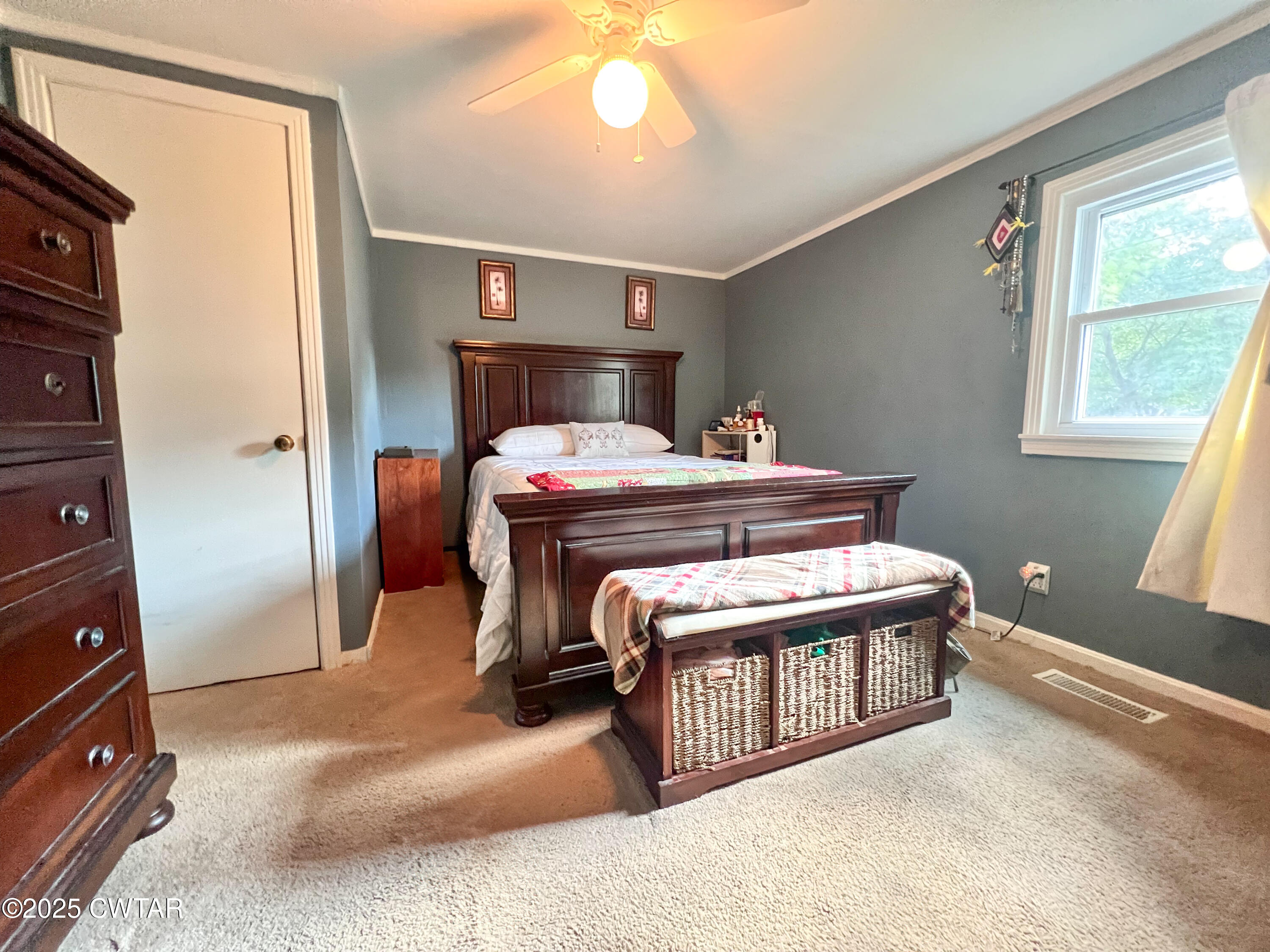154 North Winchester Street McKenzie, TN 38201 - Photo 8 of 24 a room with a bed and a window