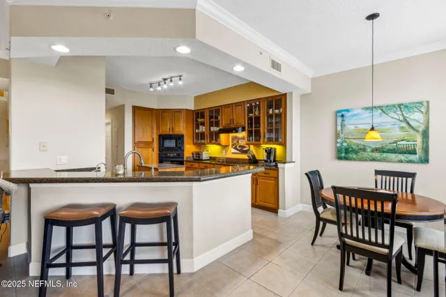 a bedroom with a bed and a lamp