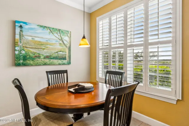 a bedroom with double bed and a window