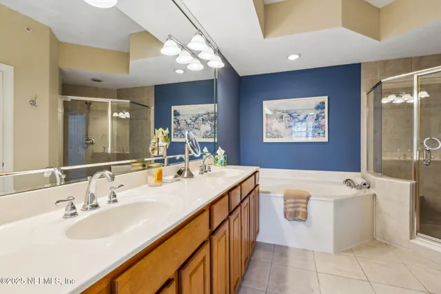 a bedroom with a bed and a dresser in it