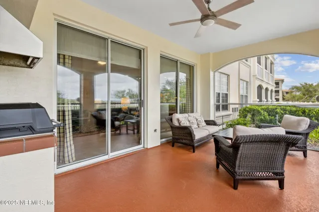 an aerial view of a house with a lake view