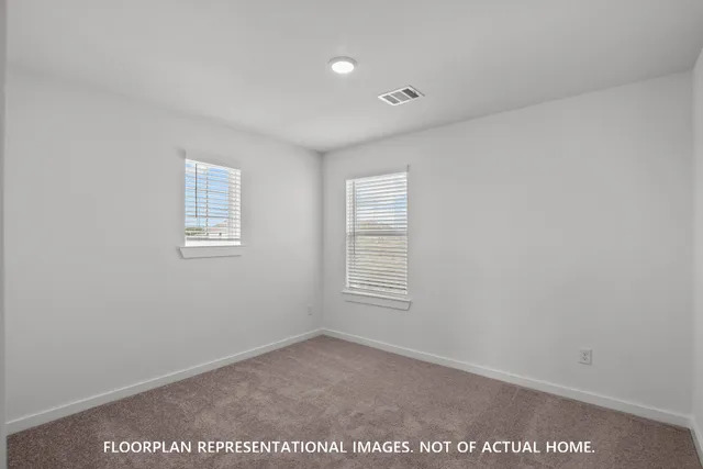 a view of a hallway with entryway